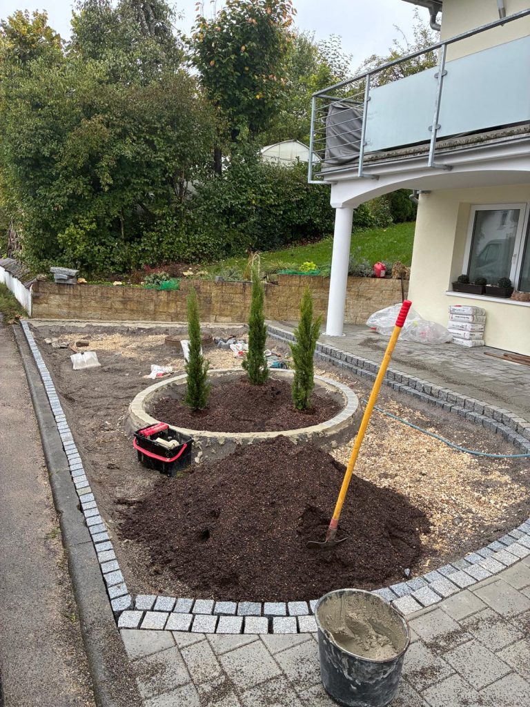 Hauseingang und Garagenzufahrtgestaltung