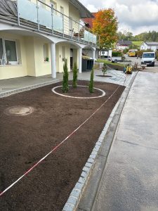 Hauseingang und Garagenzufahrtgestaltung